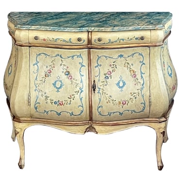 An Italian Rococo Style Butter-yellow Painted Bombe Cabinet