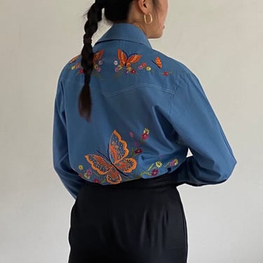 70s hand embroidered butterfly chambray shirt / vintage hand made embroidered boho soft blue snap up western shirt blouse | Large 