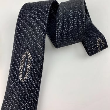 Early 1960's Tie - Tiny Baby Blue Dot Pattern with an Oval Crest - All Quality Imported Silk 