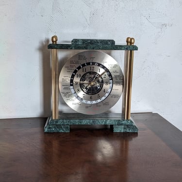 Vintage Green Marble and Brass Airplane World Time Zones Mantle Clock in working condition 