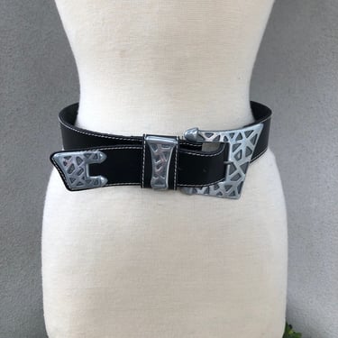 Vintage boho black leather belt geometric style bold silver tone buckle by Kandell & Marcus sz SM fits 27-30” 