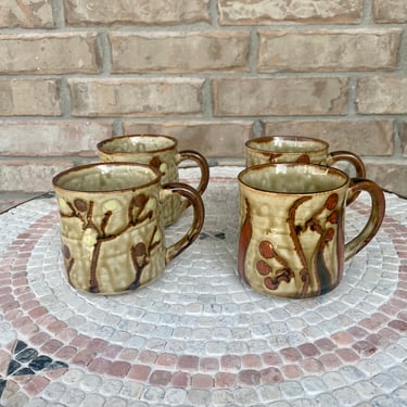 Set of Four Mid Century Glazed Pottery Mugs with Abstract Floral Designs, Organic Styling, Nature Theme 