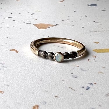 Ellipsis Ring in Black and Gold 14k gold fill and sterling silver with a 3mm genuine opal 