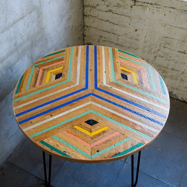 Round reclaimed lath side table with black hairpin legs 