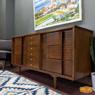 Mid-Century Modern walnut 9-drawer dresser with laminate top by Johnson Carper