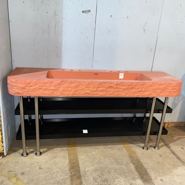 Modern Double Bathroom Vanity with Coral-Colored Countertop and Integrated Sink