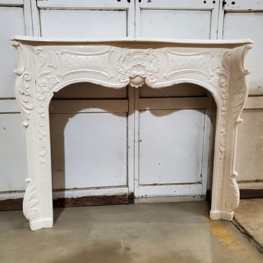 White Fireplace Mantel with Curves and Carved Quilted Detail