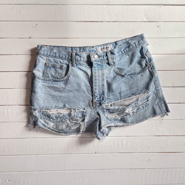 cut off jean shorts | 90s vintage distressed thrashed frayed soft faded daisy dukes short denim shorts 