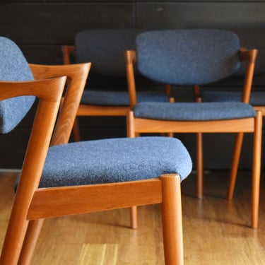 Four Danish modern teak Kai Kristensen "Z" dining chairs w/new gray upholstery 