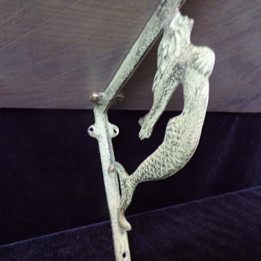 ws/Artisan-Crafted Shelf with Mermaid Brackets