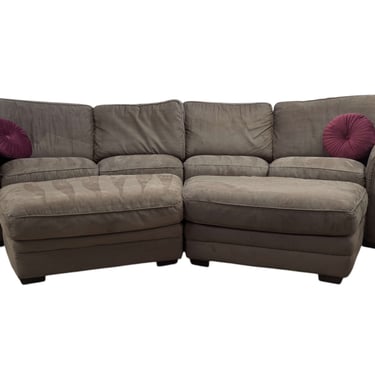 Brown Curved Sectional + Two Ottoman