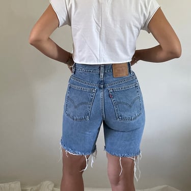 80s Levis cut offs shorts / vintage Levis 550 faded soft cut off high waisted classic jean shorts  | 27 Waist 