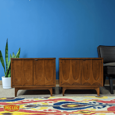 Pair of Mid-Century Modern walnut nightstands from the Brasilia collection by Broyhill