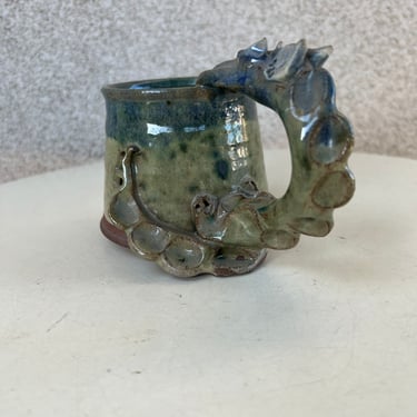 Vintage fantasy magic dragon handle theme 3D studio art pottery stoneware blue glaze brown mug holds 8 oz 