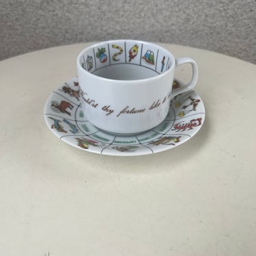 Vintage fortune telling cup saucer by International collectors Guild 