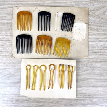 Celluloid hair combs and hairpins on store display - 1940s vintage 