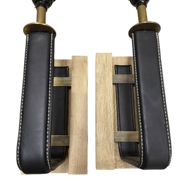 Pair limited edition, Oak, bronze and black leather sconces