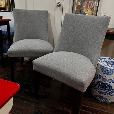 Gray upholstered chairs, stud details. 4 available. 24” x 21” x 36” seat height 19” 