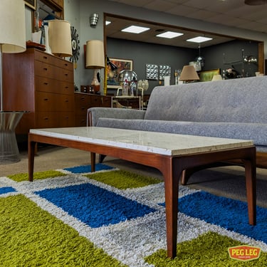 Mid-Century Modern walnut coffee table with travertine top from the Rhythm collection by Lane