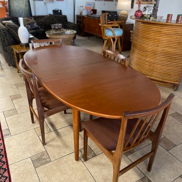 Mid Century Teak Oval Dining Table with Four Teak Spindle Back Dining Chairs