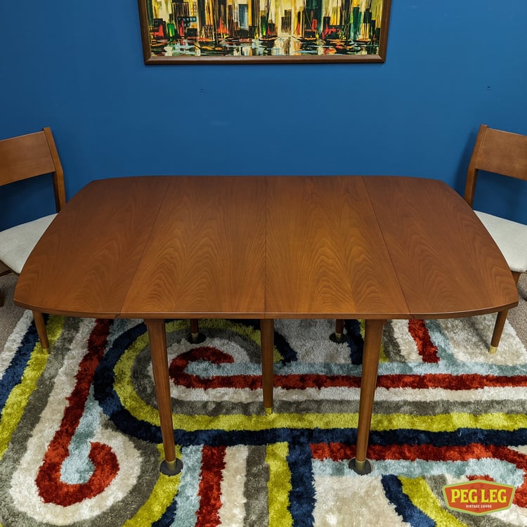 Mid-Century Modern walnut drop-leaf dining table with two leaves by Drexel