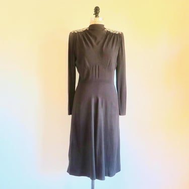 sachin and babi light blue dress In the 1940s, winter fashion for women was shaped by both elegance and  practicality. Women embraced tailored coats, wool dresses, and layered  ensembles that combined warmth with sophistication. Accessories like  gloves, hats, main image 1
