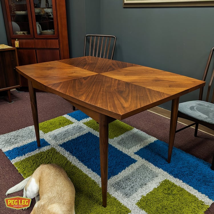 Mid-Century Modern walnut dining table from the Dania collection by American of Martinsville