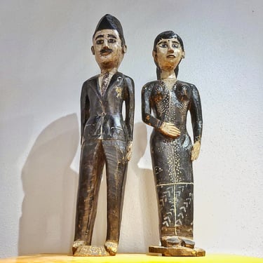 CARVED WOOD FOLK ART FIGURES OF A MAN AND WOMAN (BRIDE & GROOM?)