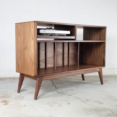 The "Felix" is a mid century modern style record player console 