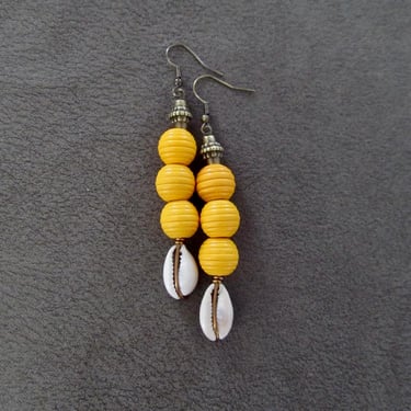 Wooden and cowrie shell earrings, yellow 