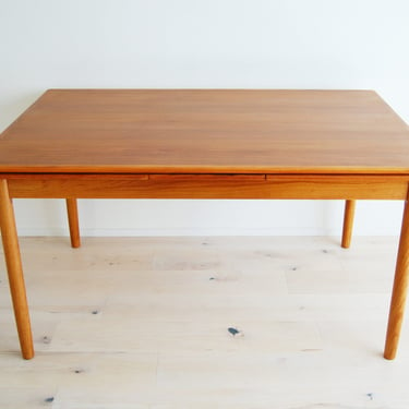 Danish Modern Teak Extendable Rectangular Dining Table with Draw-leaf Extensions Made in Denmark 