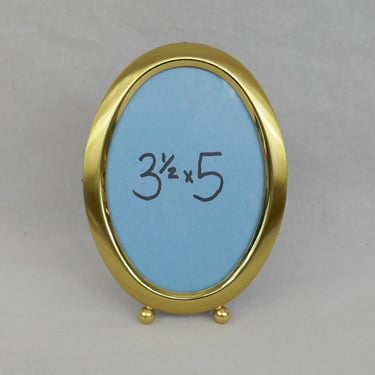Vintage Oval Metal Picture Frame w/ Glass - Shiny Gold or Brass look - Ball Feet - Holds a 3 1/2" x 5" Photo - Tabletop or Wall Display 