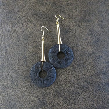 Large carved black wooden earrings 