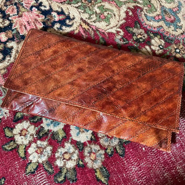 Vintage ‘80s burnt orange snakeskin clutch | sienna leather handbag, envelope clutch, Fall vibes , Autumn colors 