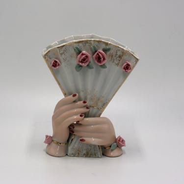 vintage fan vase with hands 