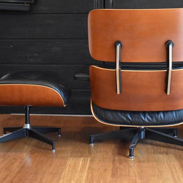Vintage Eames cherry lounge chair and ottoman by Herman Miller, circa 2001 