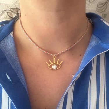 Beholder Pendant in Opal - handmade evil eye pendant with opal on braided pink and gold cord 