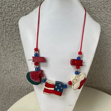 Vintage kitsch patriotic USA beaded wood necklace red white blue on satin red rope adjustable 