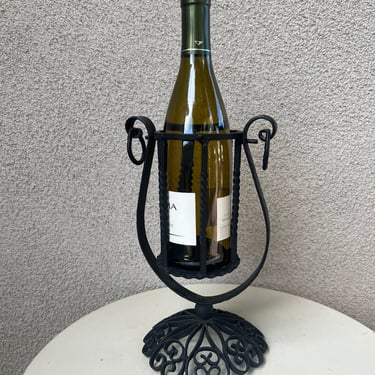 Vintage Spanish Revival black iron wine stand holder gothic. Size 11.5” 