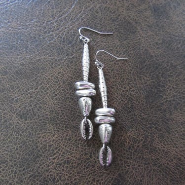 Long modern silver cowrie shell earrings 