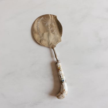 vintage English serving spoon with ceramic handle