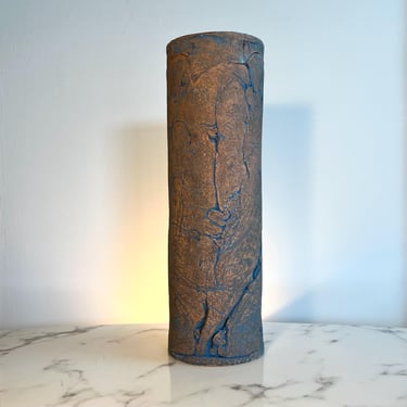 Tall cylindrical lidded ceramic container signed “Thomas” 