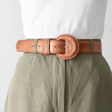 vintage tan leather belt with round buckle 