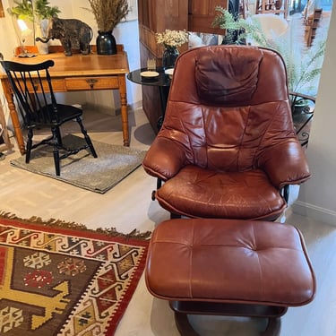 Leather recliner and ottoman 