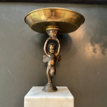 Gorgeous brass compote dish with cherub and marble base. 