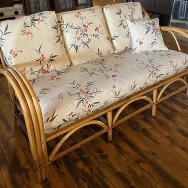 Rattan Couch w Ivory Floral Cushions