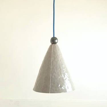 Large pendant light. Ceramic cone with bead detail. Hardwire or plugin cord 