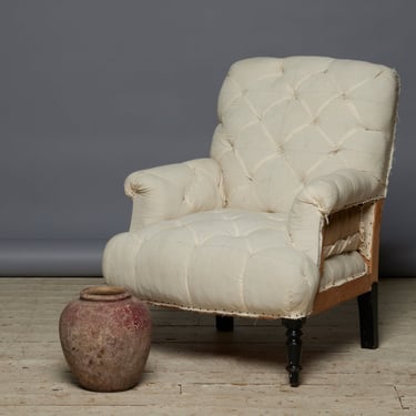 Large French Late 19th Century Tufted Rolled Arm Upholstered Chair with Crisply Turned Legs