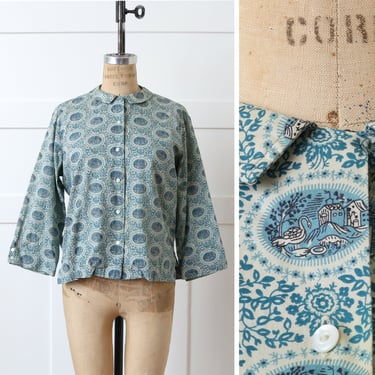 vintage 1950s cotton novelty print blouse • light turquoise blue folkloric swan print button up shirt 
