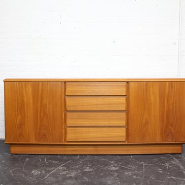 Vintage MCM 4 drawer bowed teak credenza by Nordic Furniture | Free delivery only in NYC and Hudson Valley areas 